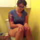 A girl with tattoos is recorded as she strains to take a shit. Poop sounds are barely audible, but she puts forth a nice effort and complains about her own smell. Over 5 minutes. Presented in 720P HD video.